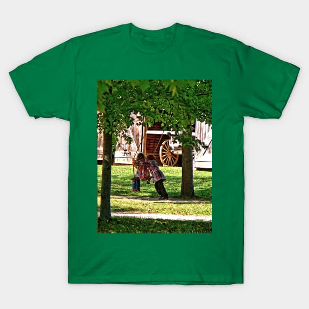 Farms - Two Sisters Playing on Swing T-Shirt by SusanSavad